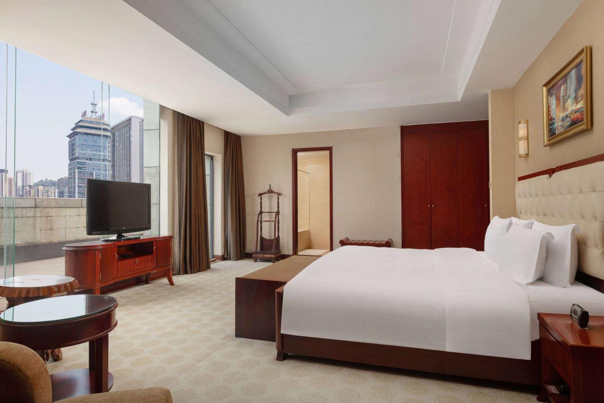 Ramada Plaza By Wyndham Chongqing West Hotell Exteriör bild