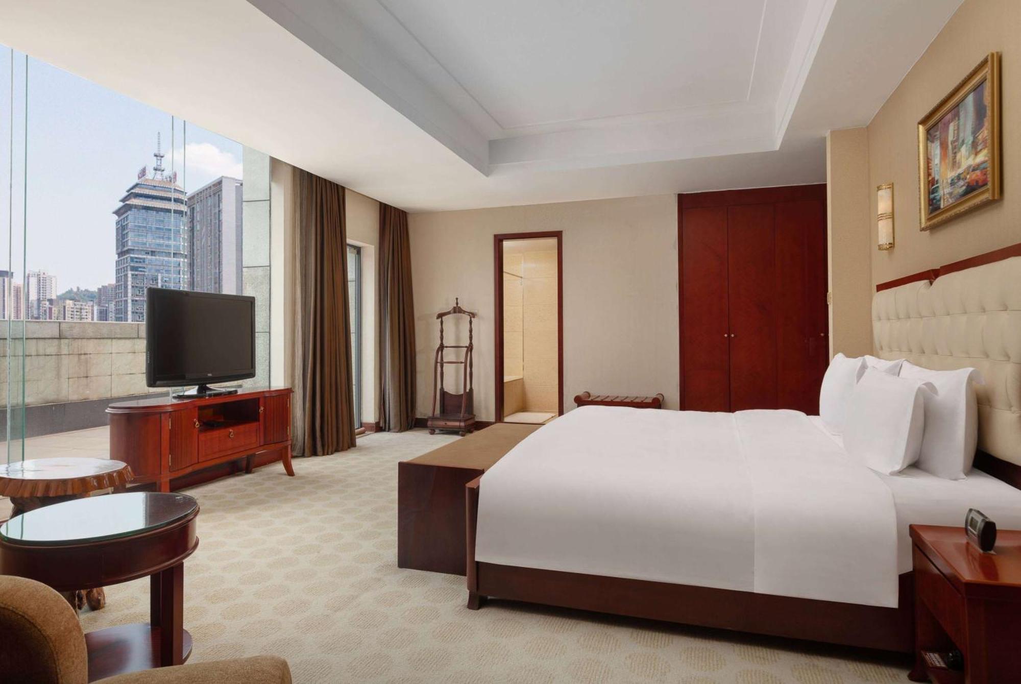 Ramada Plaza By Wyndham Chongqing West Hotell Exteriör bild