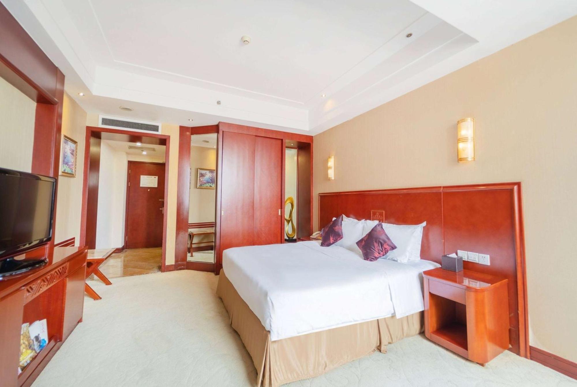 Ramada Plaza By Wyndham Chongqing West Hotell Exteriör bild