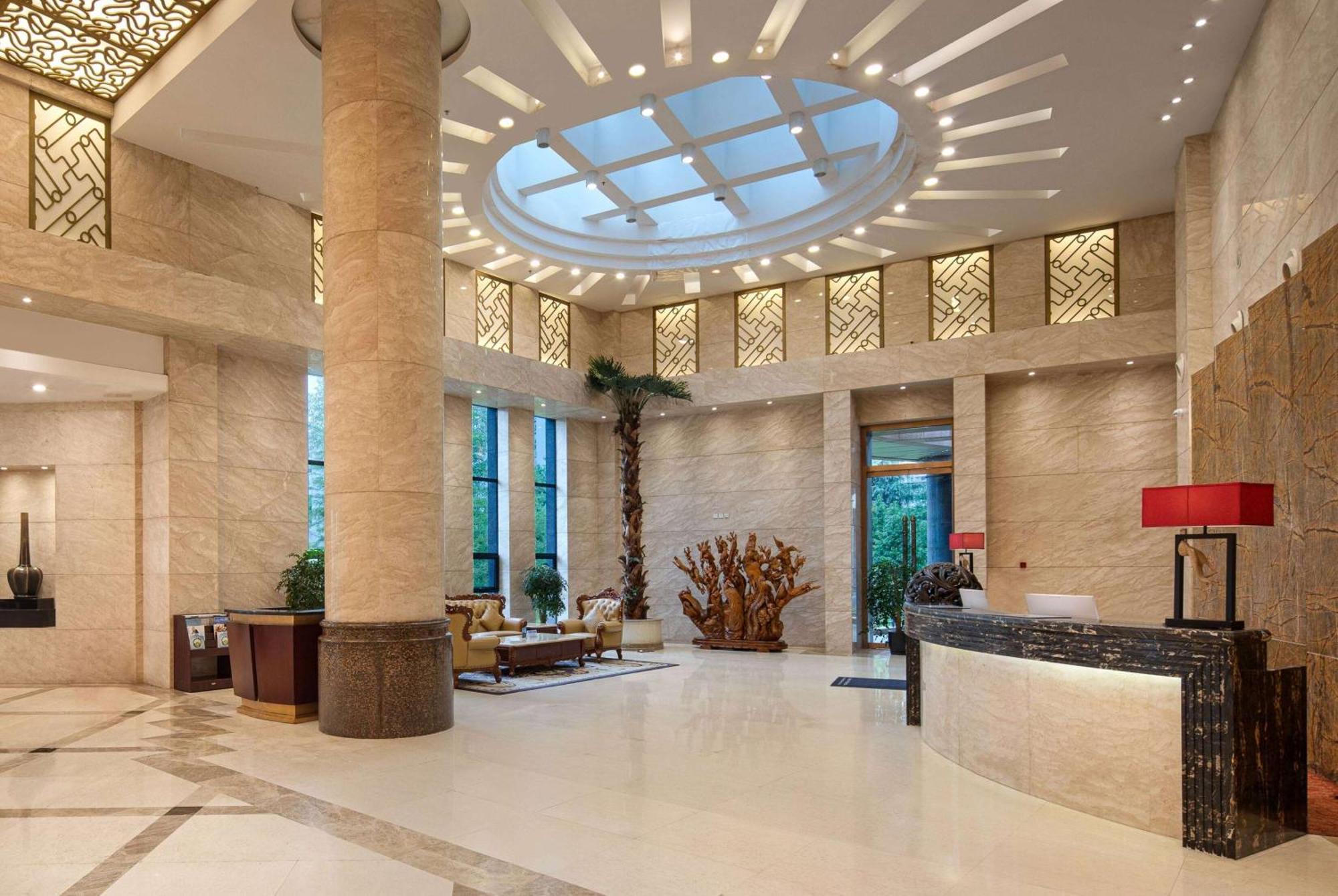 Ramada Plaza By Wyndham Chongqing West Hotell Exteriör bild